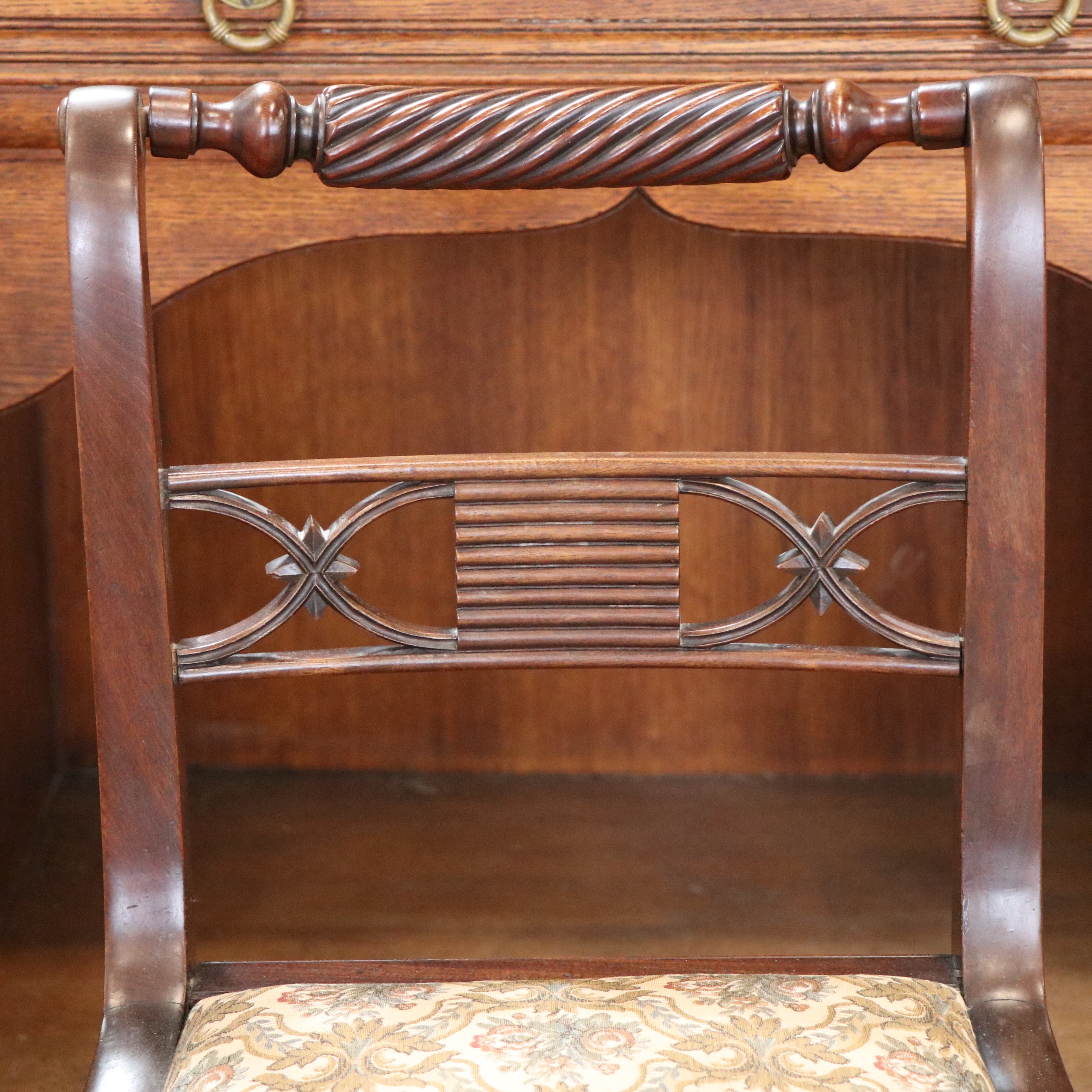 A set of four George III mahogany dining chairs having cable backs and sabre legs - Image 4 of 4