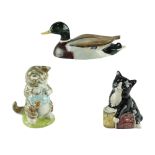 Two Beswick figurines comprising a Mallard duck and Beatrix Potter Miss Moppet together with a Royal