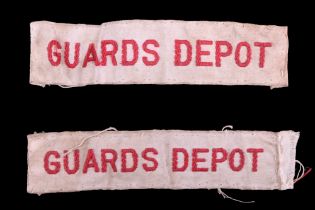 A pair of "Guards Depot" machine-woven cloth shoulder titles or labels, 75 mm x 18 mm