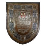 An Edwardian Arts and Crafts City of Newcastle Rifle Club Challenge Shield, in enamelled, chased and
