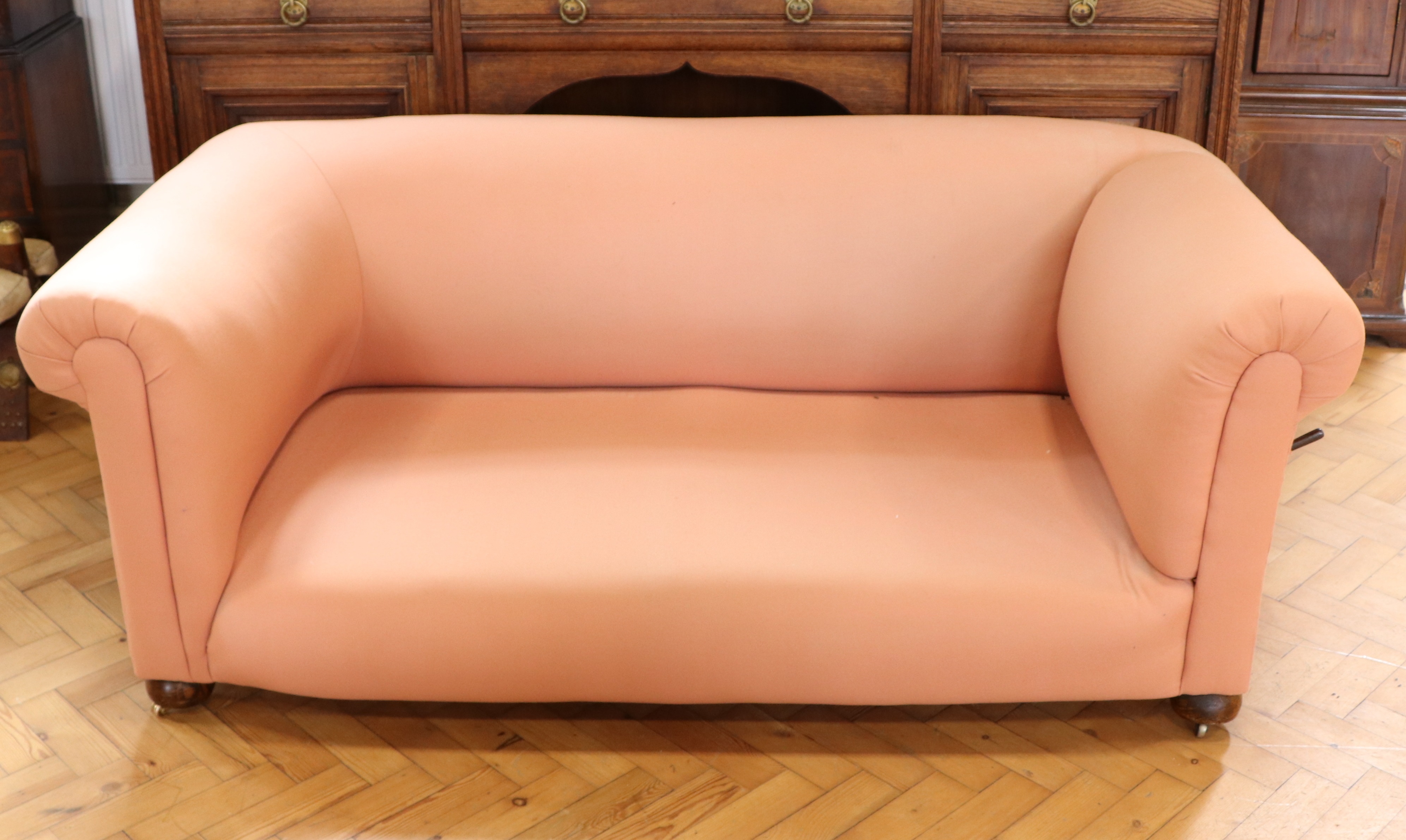 A re-upholstered early 20th Century two-seater Chesterfield drop-arm sofa, 170 cm x 85 cm x 67 cm - Image 2 of 3