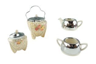 An Everhot sugar bowl and cream jug together with a Celtic Rose biscuit barrel and a preserve jar