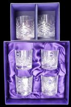 A set of four Edinburgh Crystal International whisky tumblers and two other glasses