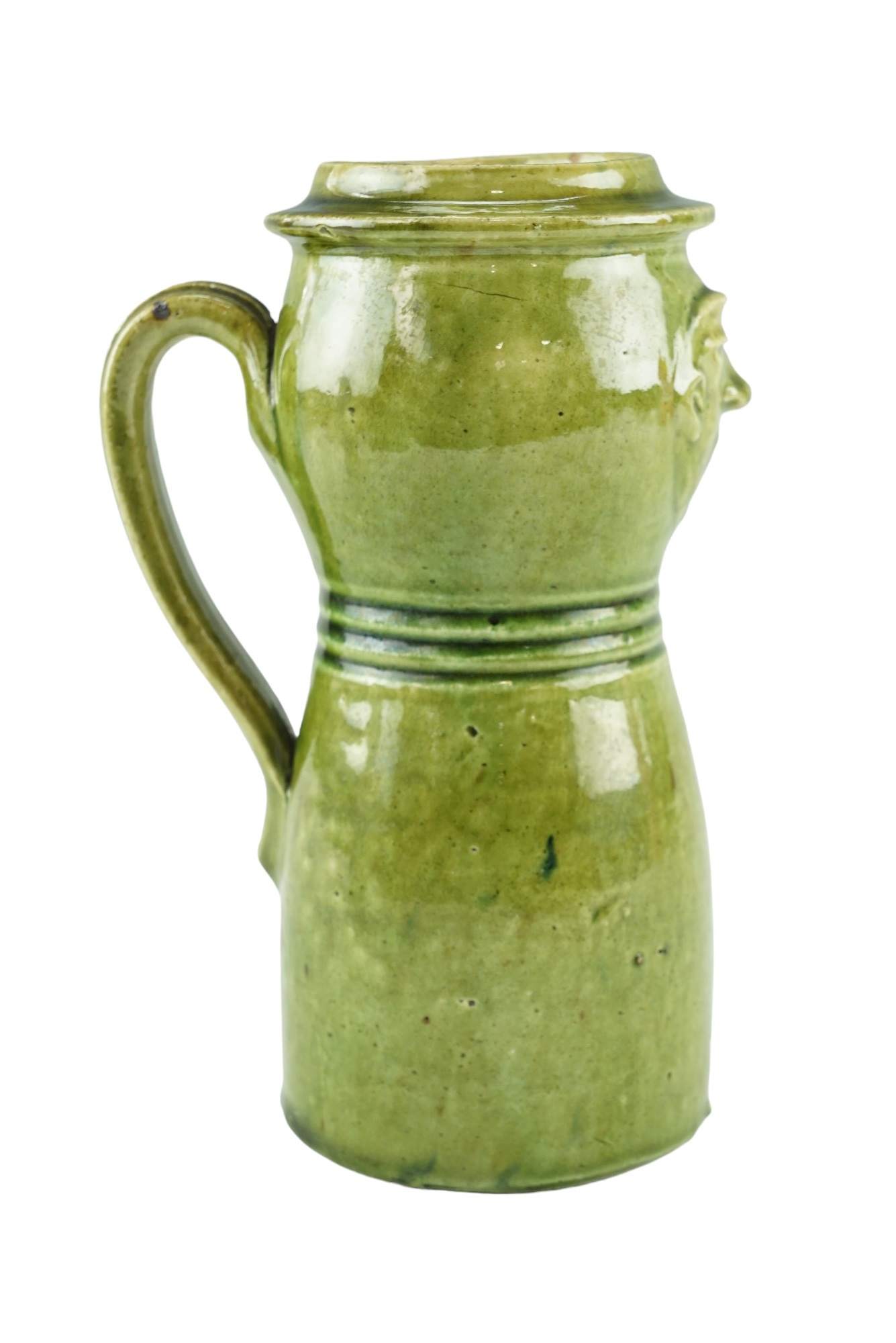 A late 19th / early 20th Century folk art / craft pottery green glazed earthenware mask jug, - Image 4 of 5