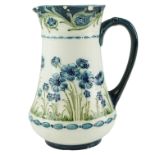 An early 20th Century William Moorcroft / James Macintyre & Co Florian Ware jug, having blue and