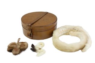 An early 20th Century cased ermine collar / stole and bow accessory together with a similar fur