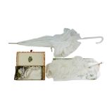 A group of vintage ladies' dressing accessories comprising white kid skin and other gloves, a faux