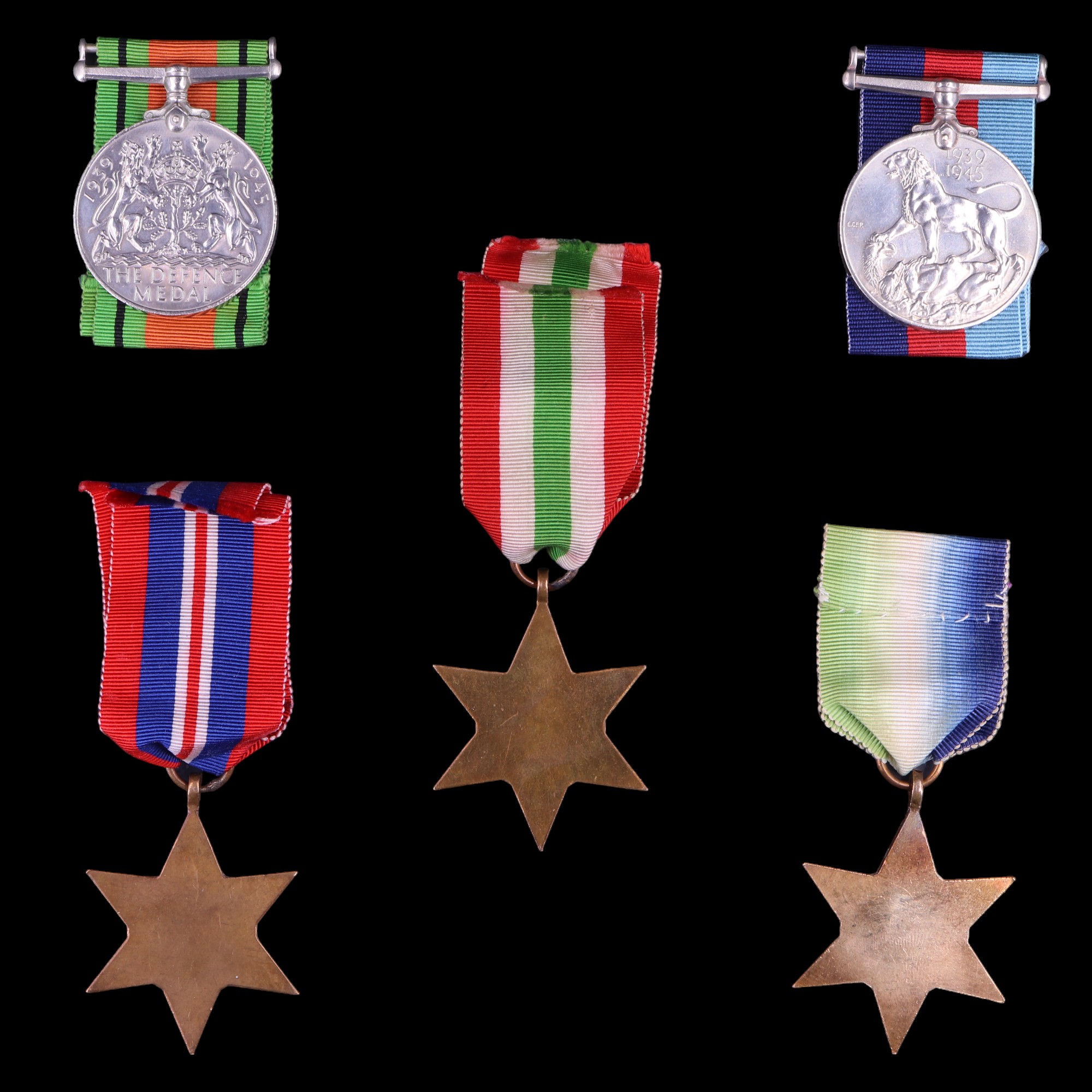 Six Second World War British campaign medals including Atlantic and Italy Stars - Image 2 of 2