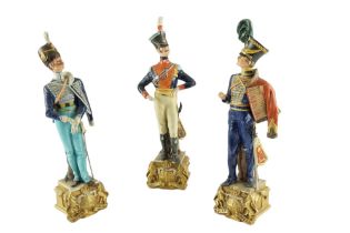 Three Capodimonte bisque porcelain military figurines by Bruni Merli for Doccia depicting two