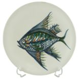 A mid-20th Century plate hand-painted by Alan Piclet in depiction of a fish, 24 cm diameter