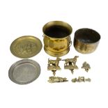 A quantity of decorative brassware including novelty door knockers, an Indian cachepot and tray,