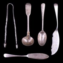 A set of Victorian silver sugar tongs, having open-work stems, shell form bowls and decorated with