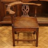 A George III oak corner armchair, 74 cm high