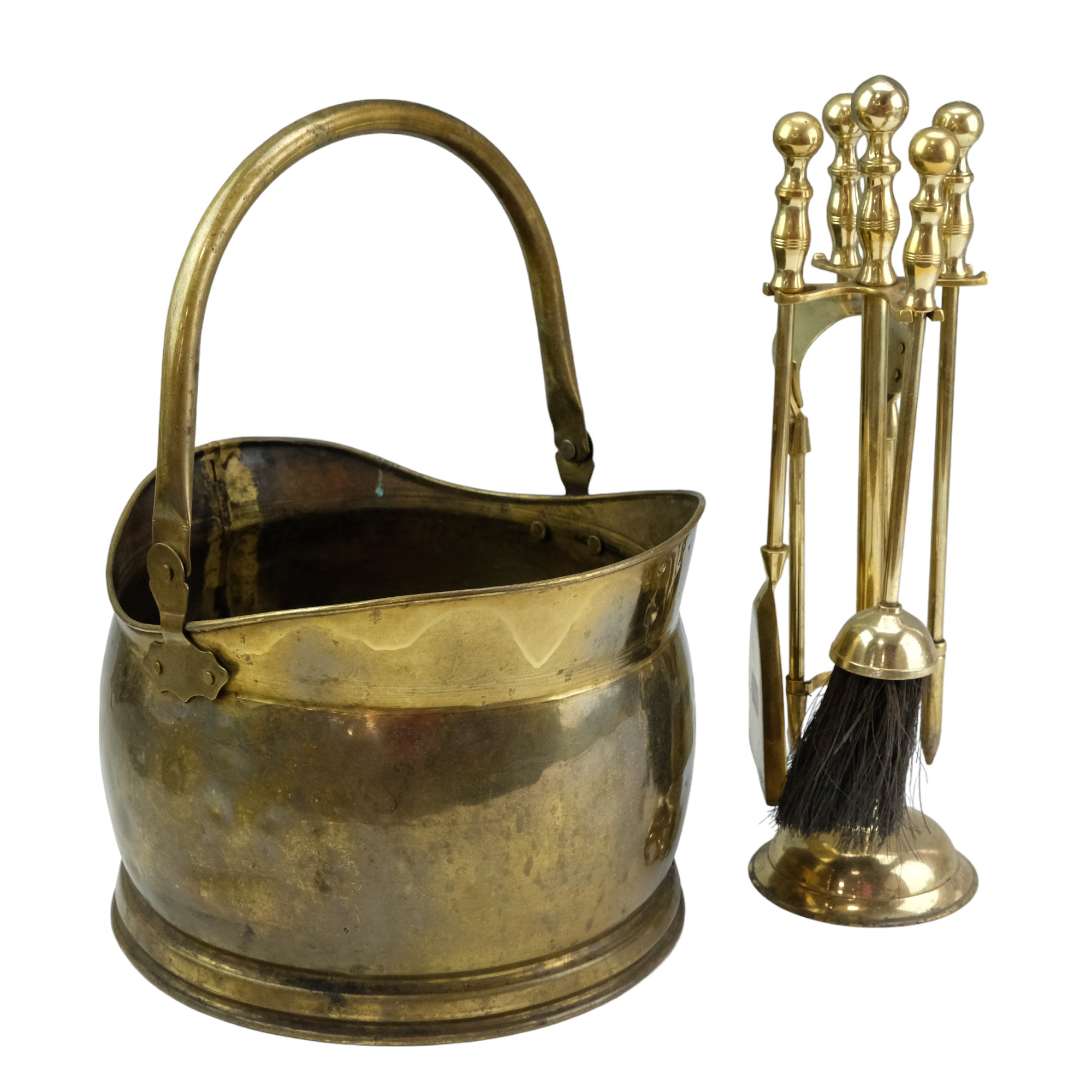 A brass coal helmet and fireside companion set