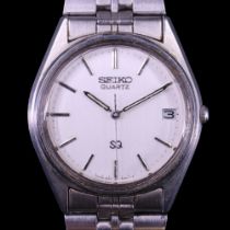 A vintage Seiko SQ stainless steel wristwatch, having a calibre 8122 quartz movement, silver face,