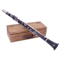 A boxed George V Boosey & Co Class A clarinet, 65 cm