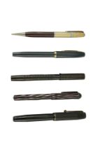 Four vintage fountain pens comprising two Shaeffers, a Waterman and a Mentmore together with a