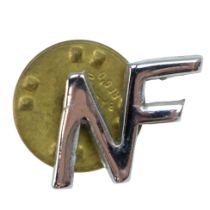 A National Front lapel pin, circa 1970s