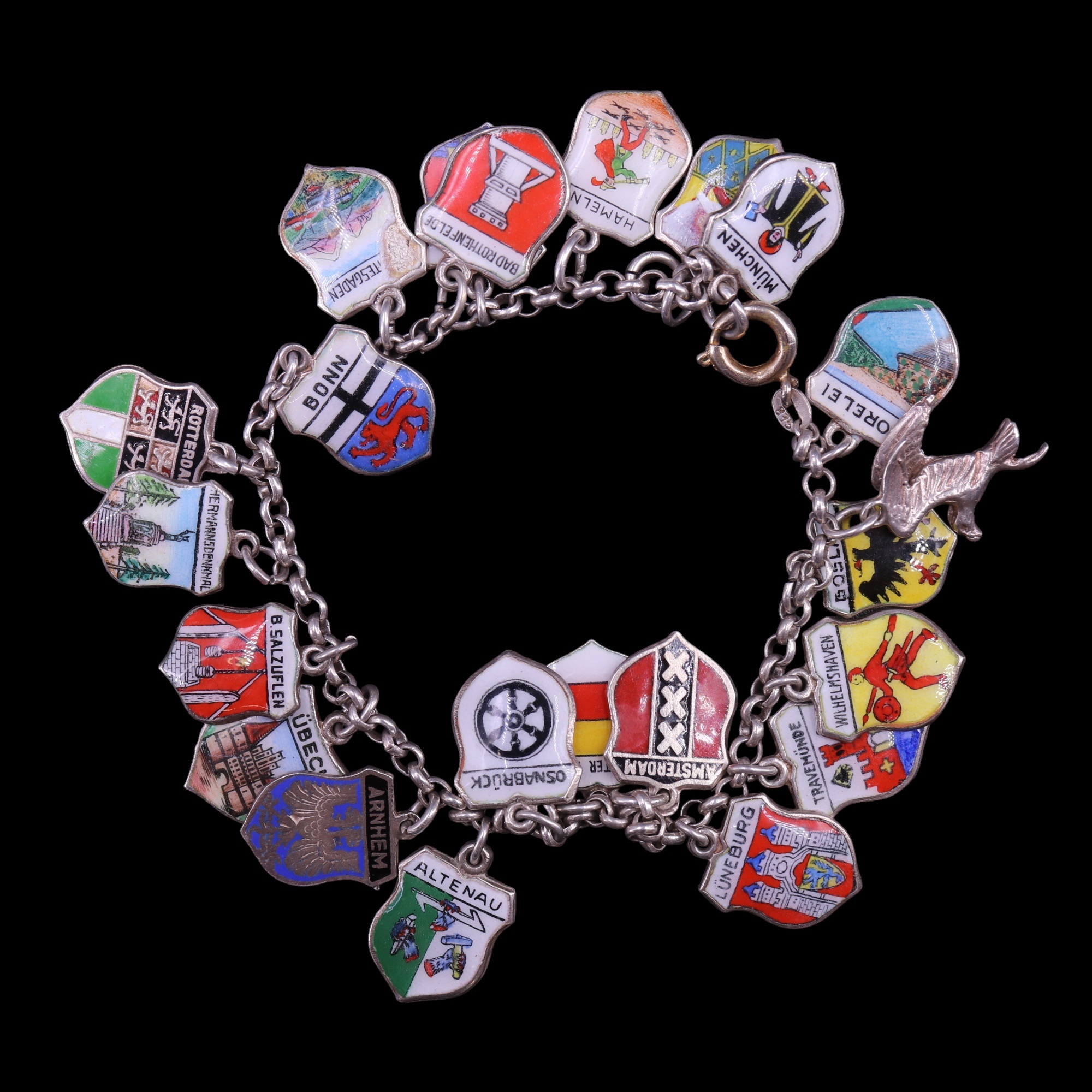 Three vintage white metal charm bracelets including European enamelled shield charms, 79 g - Image 3 of 7