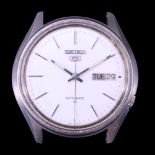 A Seiko 5 automatic day date stainless steel wristwatch, 37 mm, (runs but stops prematurely)
