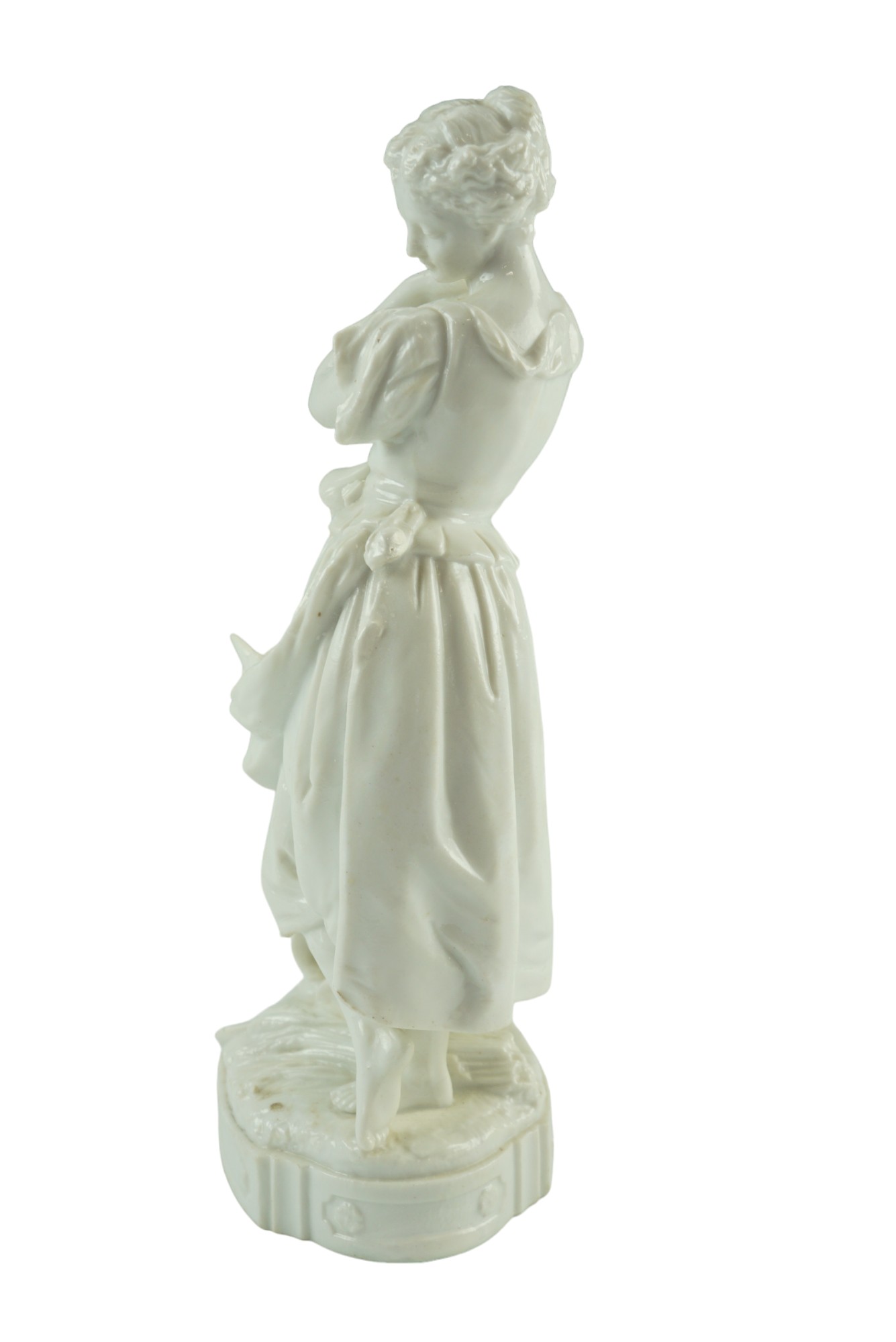 A 19th Century Meissen blanc-de-chine spill vase modelled as a young woman posed coyly, 28 cm, (a/ - Bild 2 aus 5