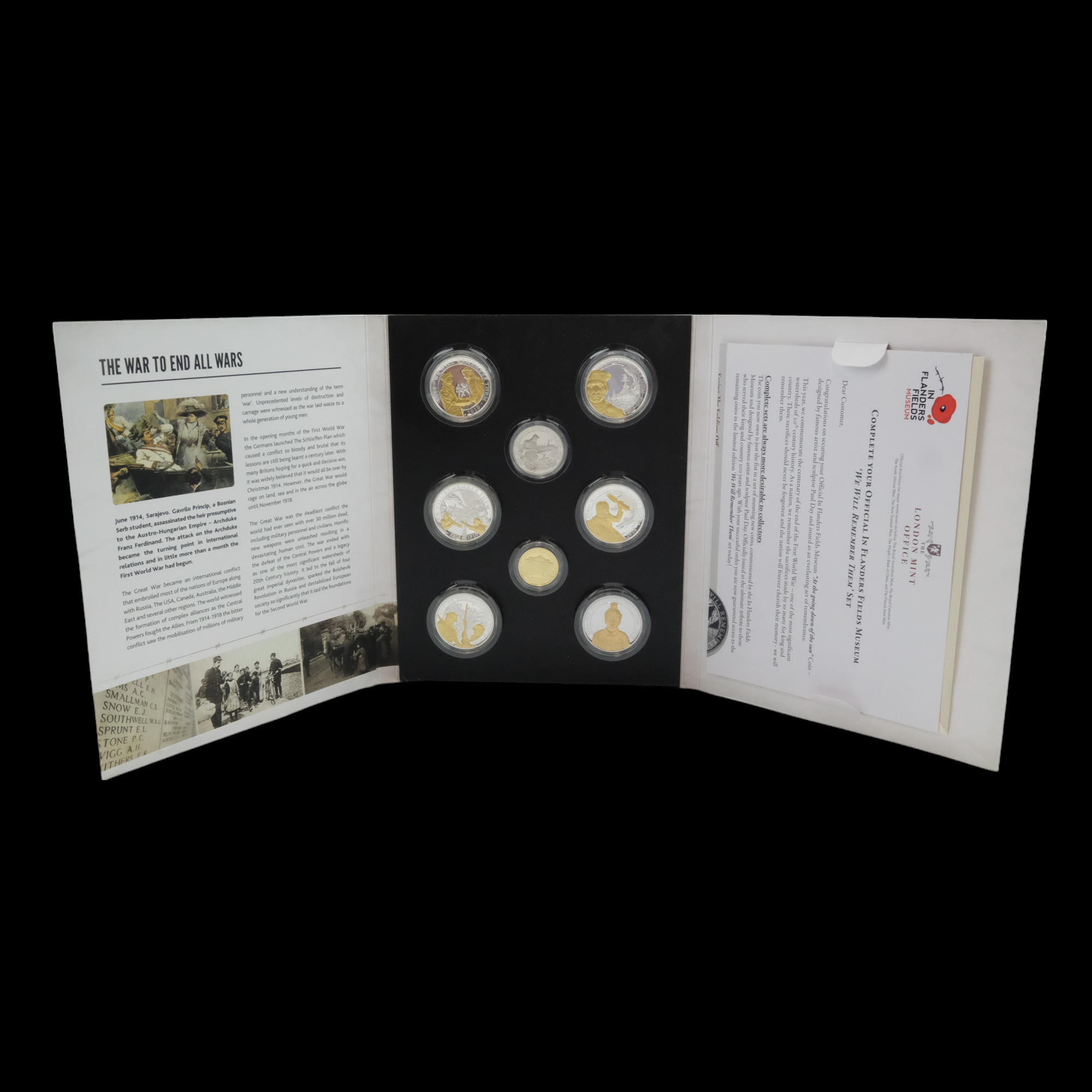 "We Will Remember Them" coin set comprising a 9 ct gold double crown, six silver-plated tombac