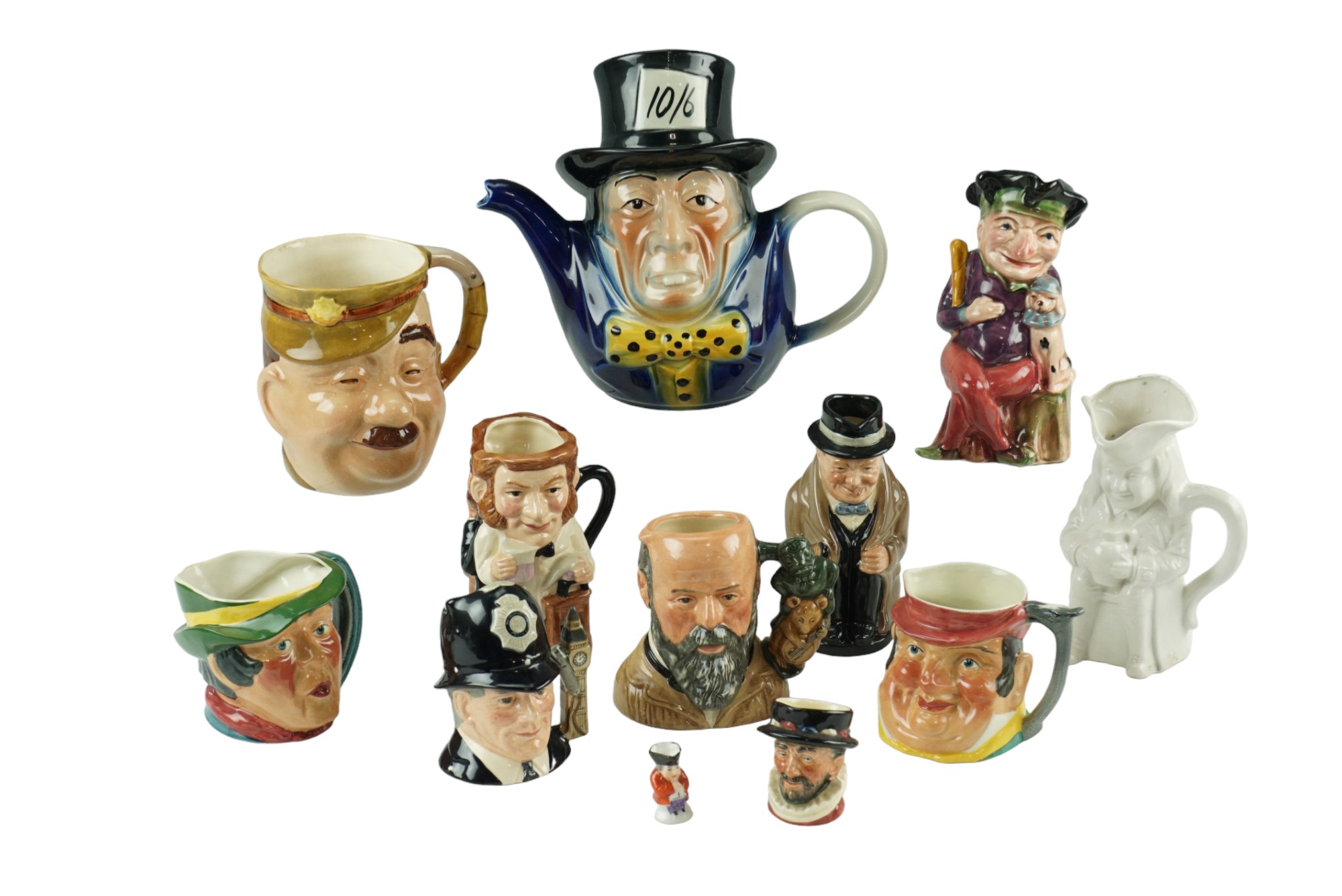 A group of Royal Doulton, Beswick and other character jugs together with a Tony Wood "Mad Hatter"