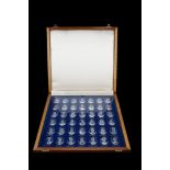 A Danbury Mint "The Royal Crystal Cameos" cased collection, 34 x 36 x 3 cm