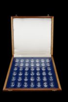 A Danbury Mint "The Royal Crystal Cameos" cased collection, 34 x 36 x 3 cm