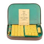 A vintage Mahjong set in hide case, mid-to-late 20th Century, case 30 x 19 x 4 cm