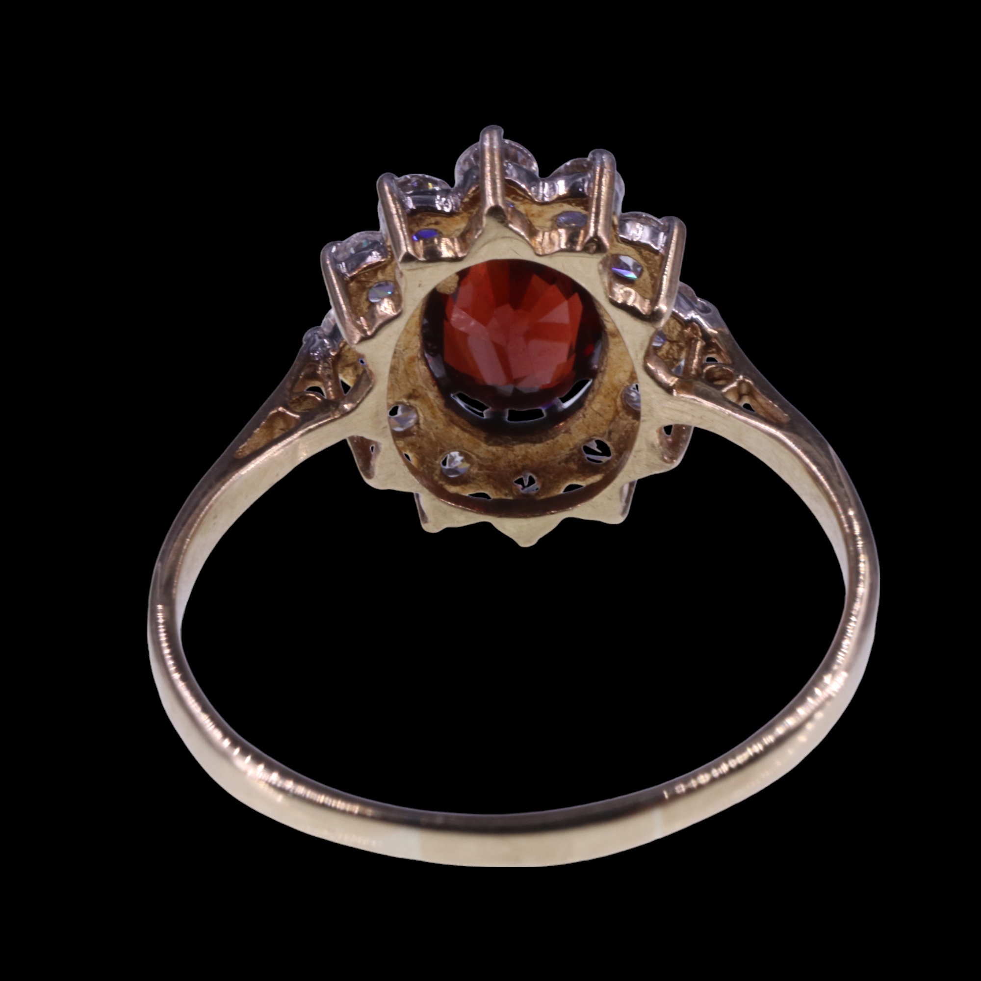 A 1980s garnet and white stone cluster ring, the central oval-cut garnet of approx. 1.4 cts, claw- - Image 4 of 5