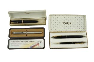 Two vintage cased Parker pens comprising a Duofold and 45 Flighter together with a similar Parker 17