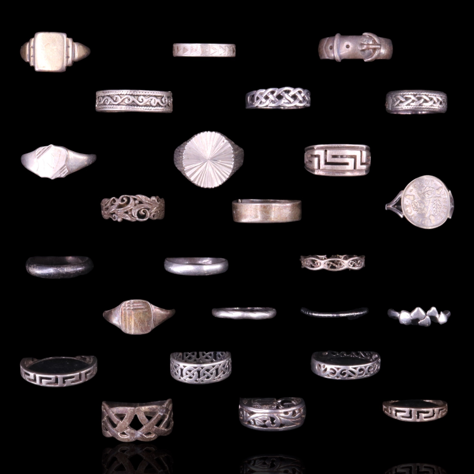 A group of silver / white metal signet rings, "buckle rings and bands, 77 g