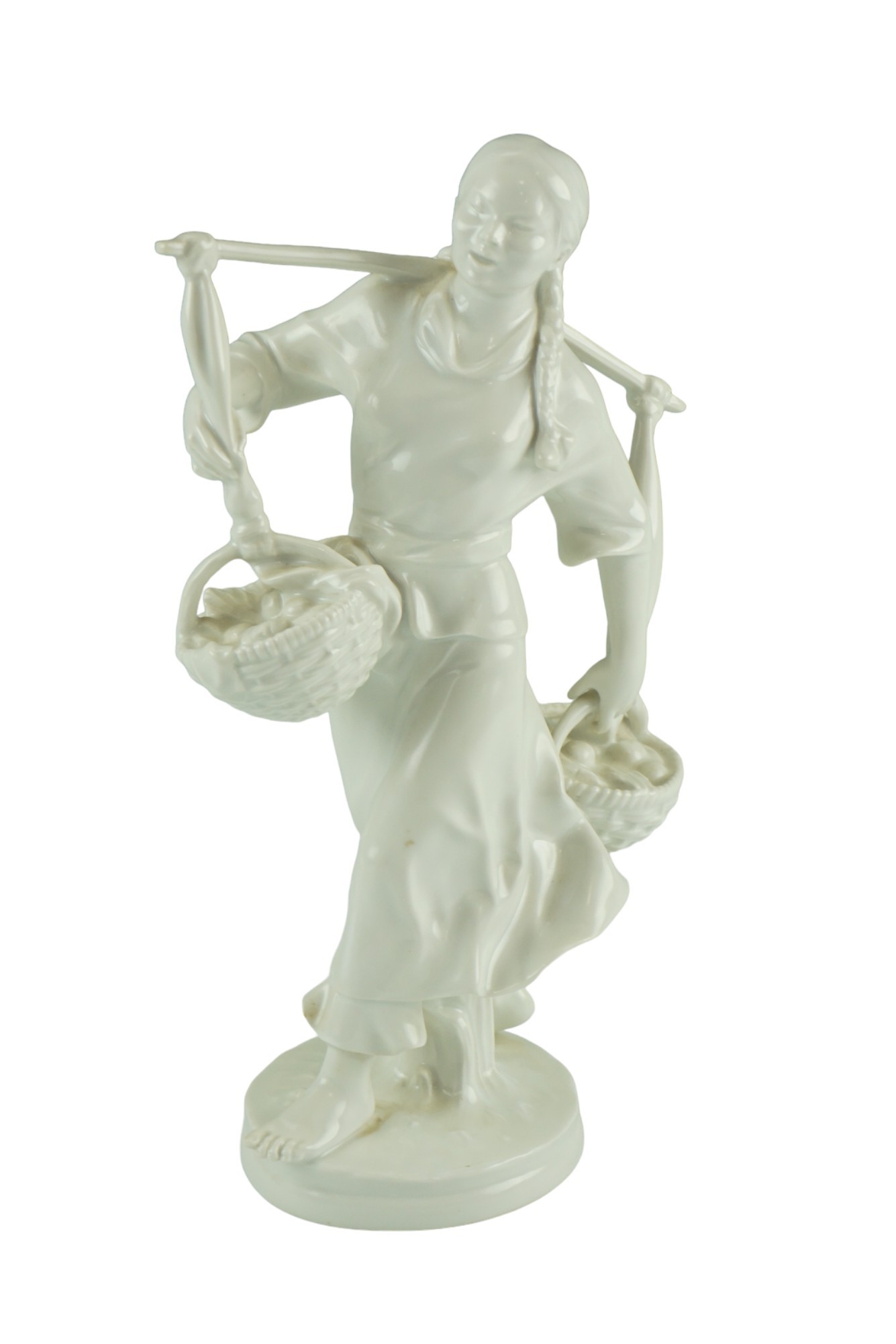 A Meissen Weifs blanc-de-chine figurine of a Korean girl carrying fruit baskets, designed by Max