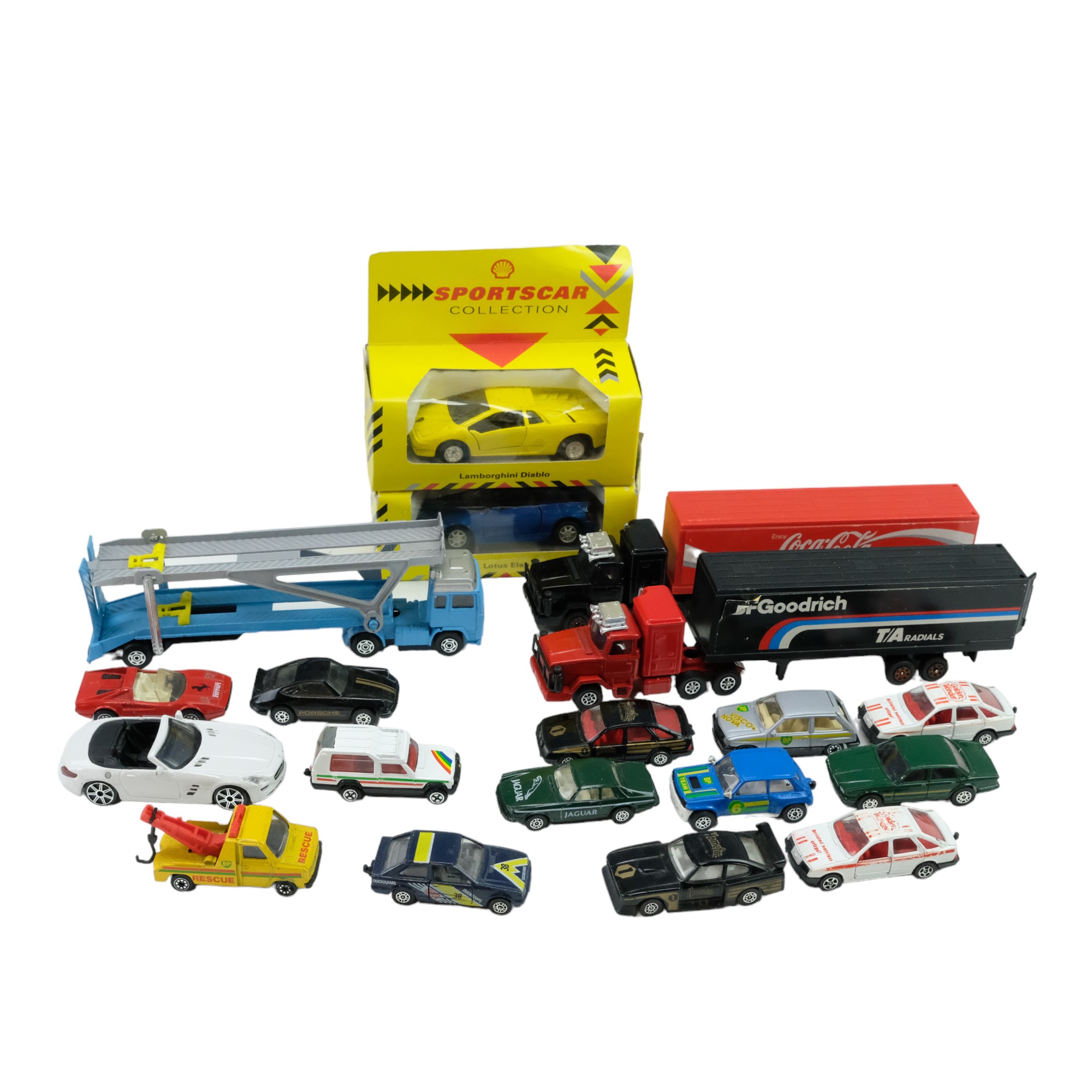 Corgi and Matchbox diecast model cars and wagons including a Coca-Cola wagon, play-worn