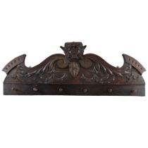 A late 19th Century Flemish style carved oak coat and hat rack, (converted), 100cm