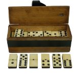 A set of bone and ebony dominoes