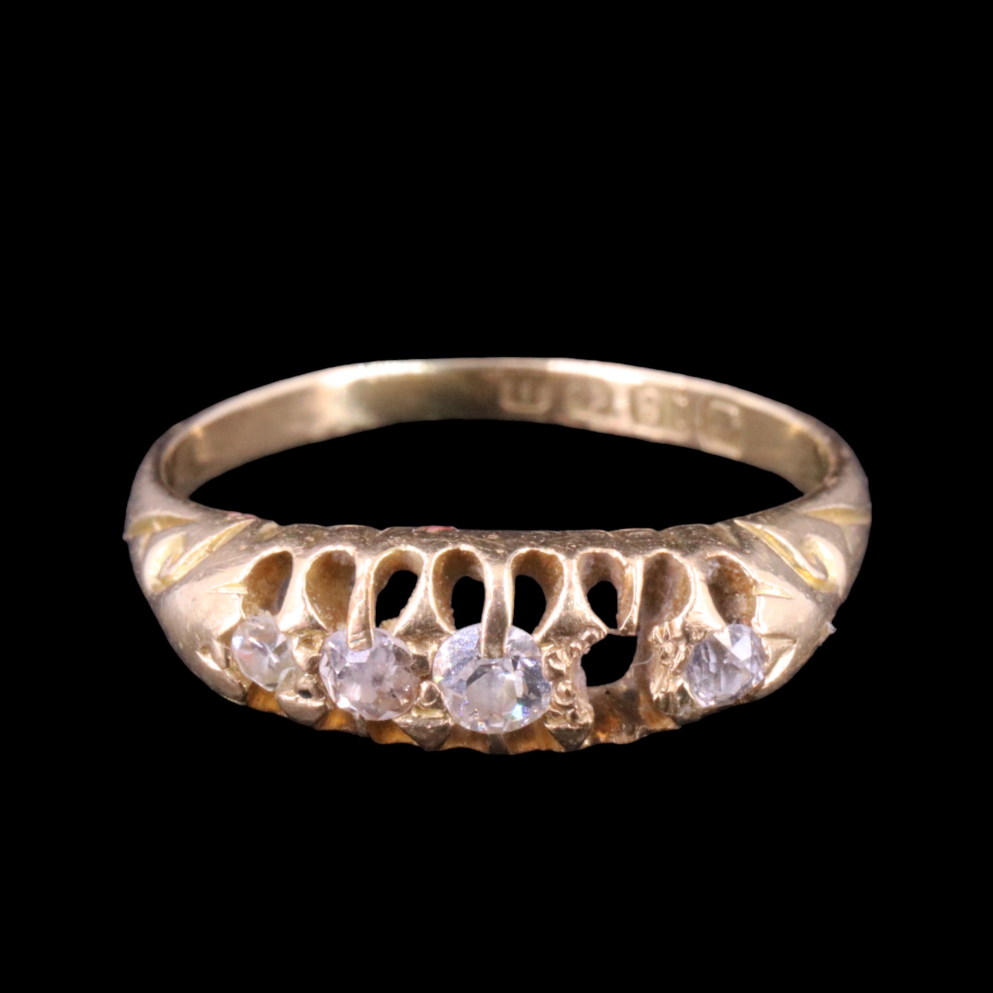 An early 20th Century five-stone diamond ring, the graded round-cut stones gallery-set on a tapering - Image 2 of 4