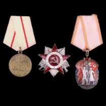 A Soviet Order of the Patriotic War, numbered 3107720, together with an Order of the Badge of Honour