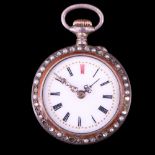 A late 19th Century lady's fob watch, having a Swiss crown-wound and pin-set movement and white