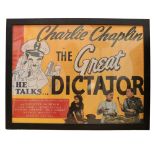 A Charlie Chaplin 'The Great Dictator' reproduction film poster, in ebonised frame under glass, 67 x