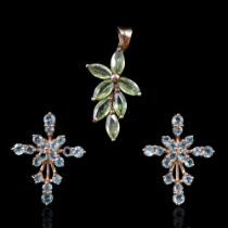 A pair of cruciform 9 ct gold mounted green topaz earrings together with a similar pendant being