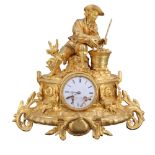 A late 19th / early 20th Century French ormolu mantle clock in the manner of Vincenti, adorned