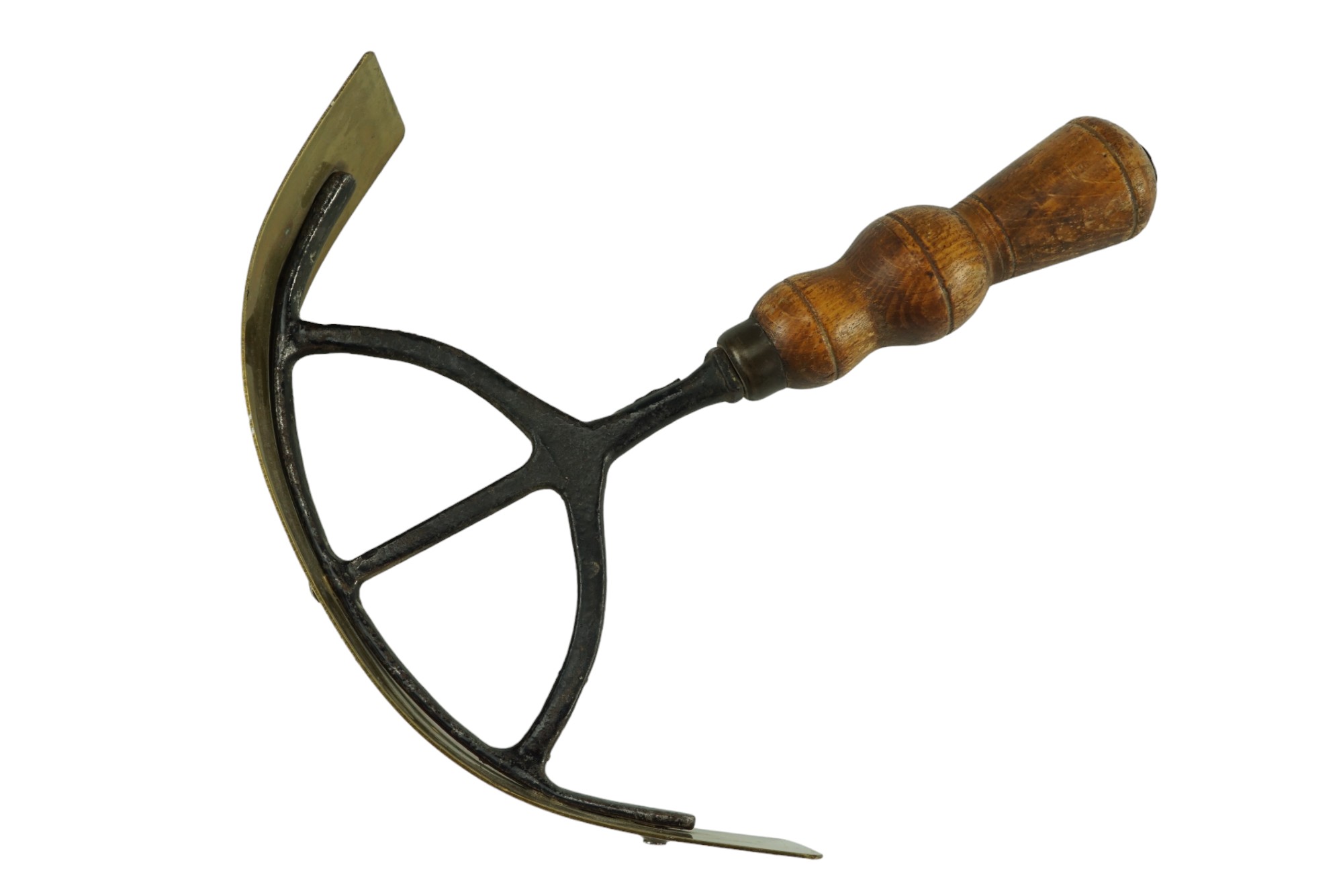 A late 19th / early 20th Century horse sweat scraper, cast iron and brass with a turned oak