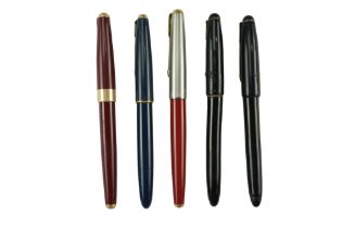 Five vintage Parker fountain pens including a 17 and a Victory