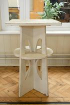 A Charles Rennie Mackintosh style painted wooden centre / window table, bearing the label of