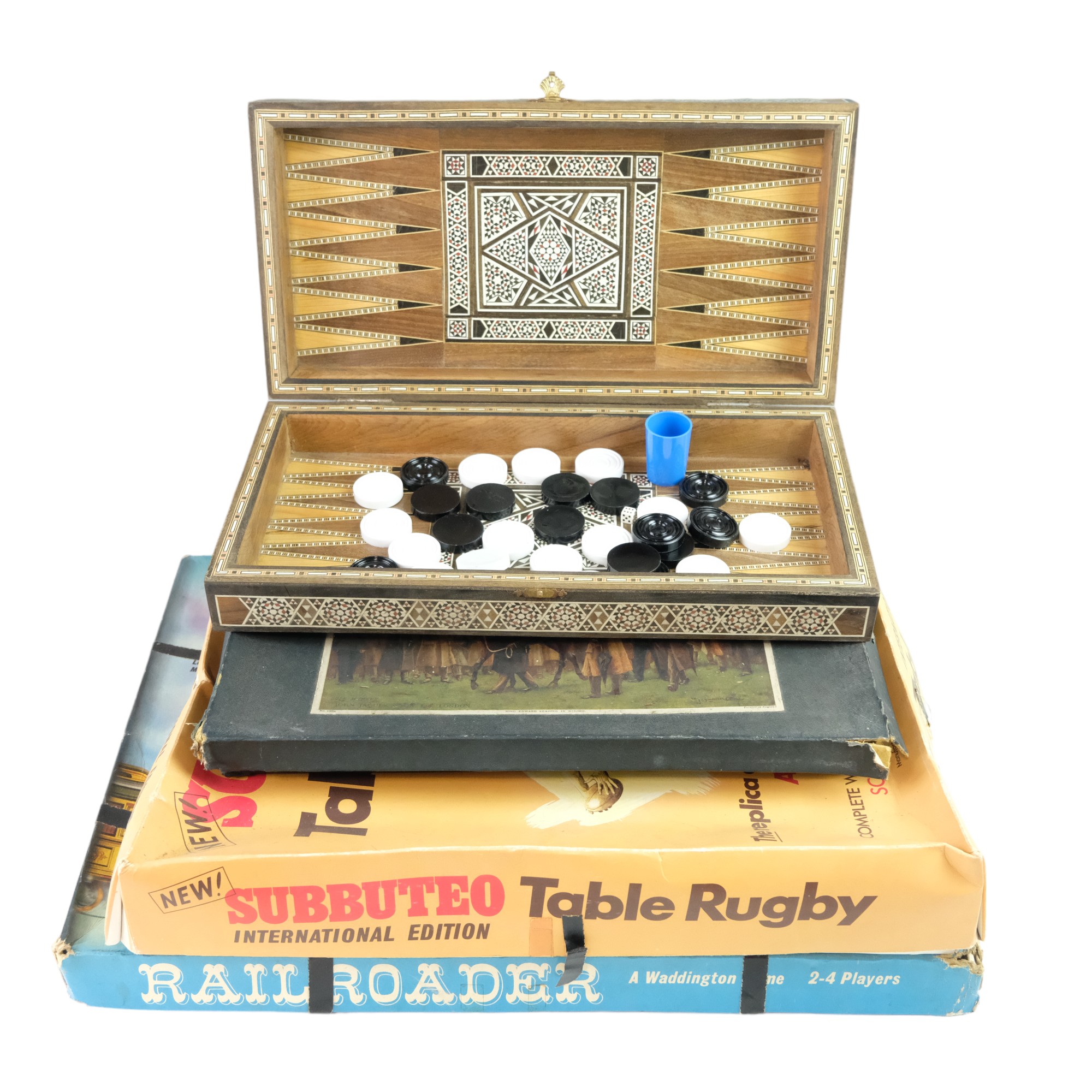 Four vintage board games including Subbuteo Table Rugby, Minoru and Railroader