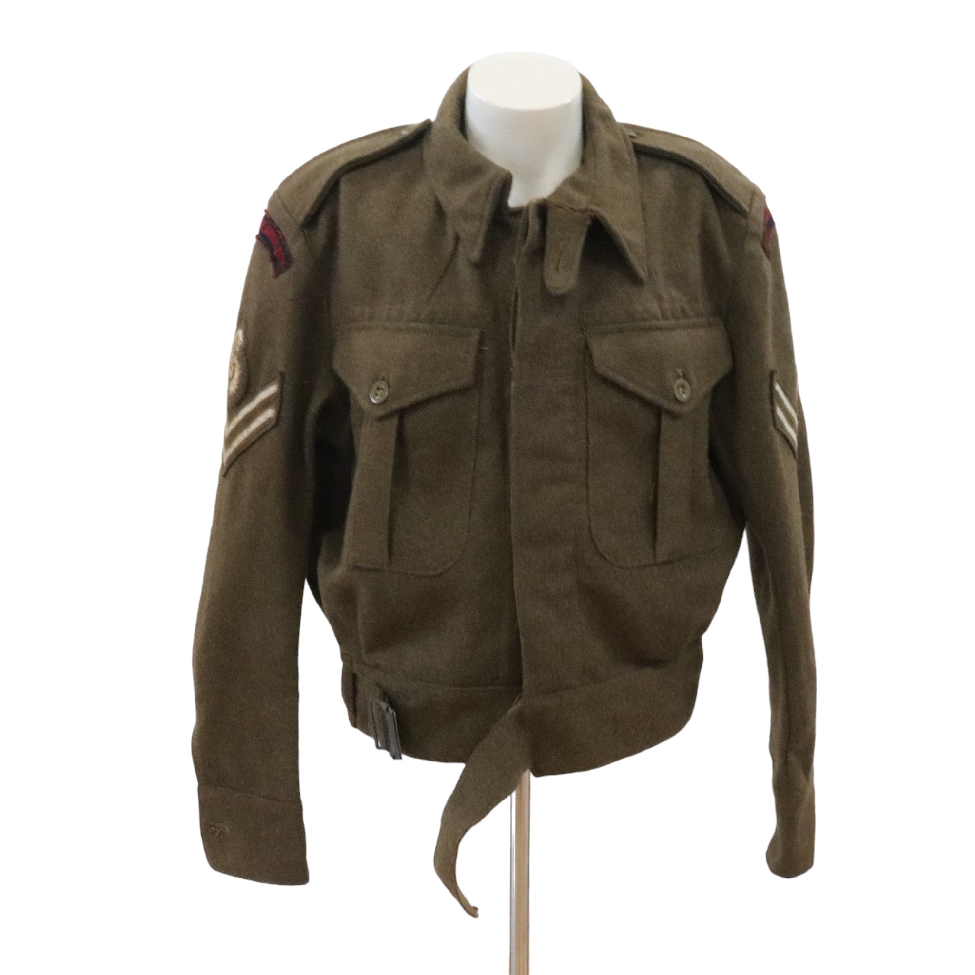 A 1946 Pattern Battledress Blouse bearing insignia of Royal Artillery surveyor