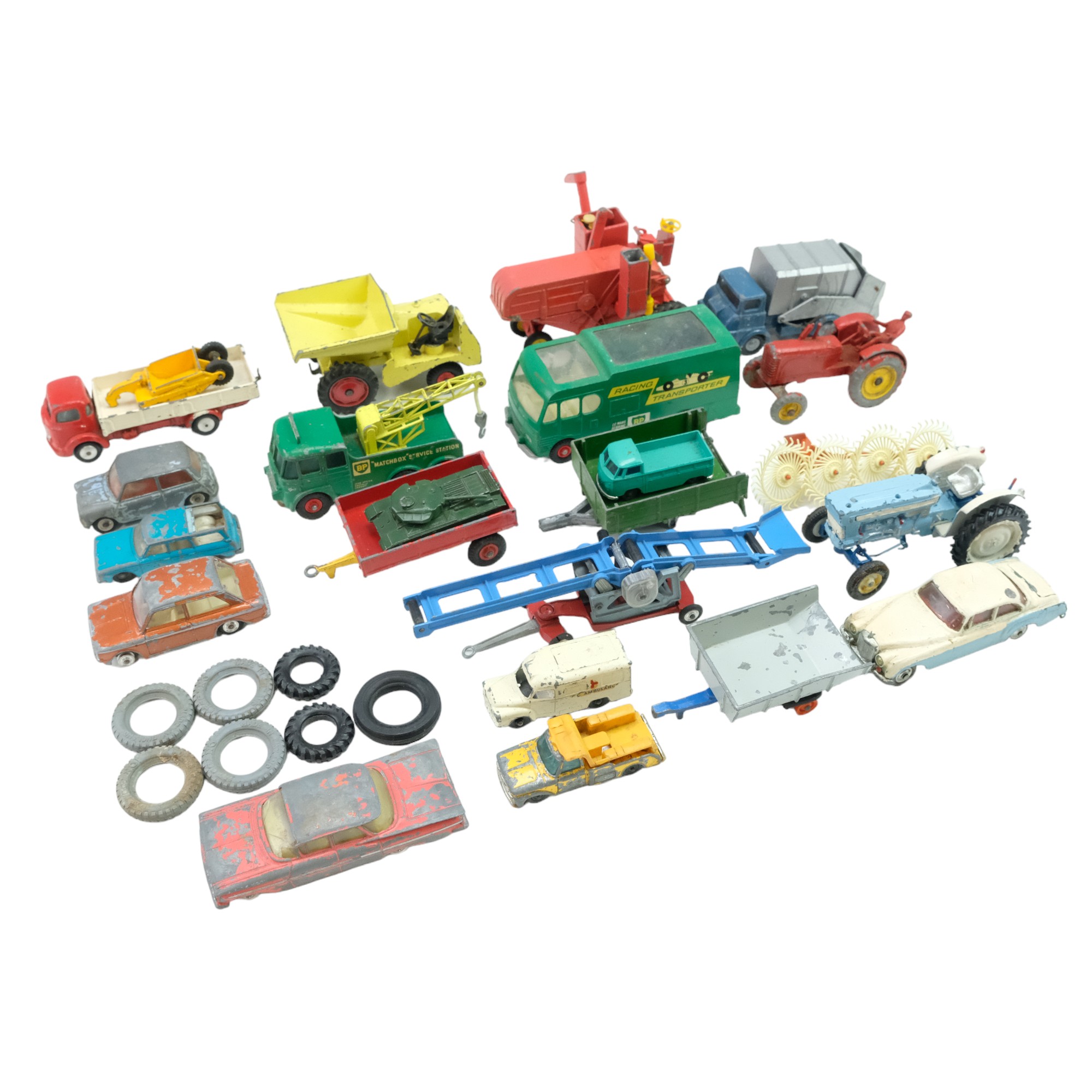 A quantity of Corgi and Matchbox diecast model cars and wagons including a racing transporter and