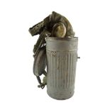 A German Third Reich Wehrmacht gas mask and canister